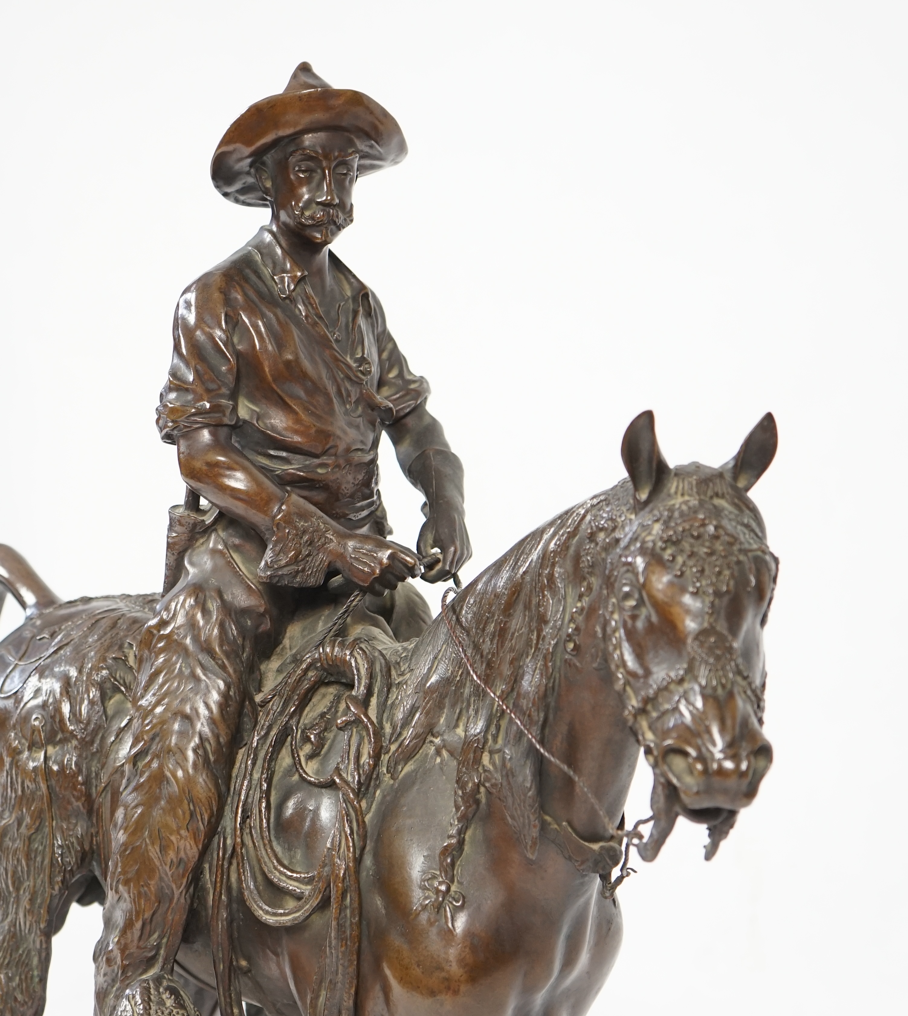 Walter Winans (St. Petersburg, 1852-Parsloe Park, Essex, 1920), a cast bronze of the artist, as a cowboy, riding the Arab stallion Skowronek, 50cm wide, 66cm high, overall 79.5cm high